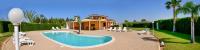 The swimming pool at or close to meadow luxury villa
