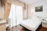 Posteľ alebo postele v izbe v ubytovaní Hotel Alda Santa Cristina