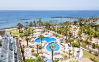 The swimming pool at or close to Apartment in beachfront complex in El Duque area, Costa Adeje