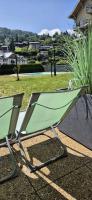 Tenis alebo squash v ubytovaní Appartement avec piscine & jardin pied de la télécabine alebo jeho okolí