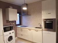 Kuchyňa alebo kuchynka v ubytovaní Apartamentos "Casa Melé" 2, Parking privado opcional