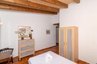 A bed or beds in a room at Villa La Casita by Sealand Villas