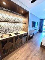 Apec Mandala Wyndham Mũi Né - R1210にあるテレビまたはエンターテインメントセンター