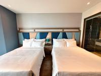 Apec Mandala Wyndham Mũi Né - R1210にあるベッド