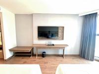 Apec Mandala Wyndham Mũi Né - R1210にあるテレビまたはエンターテインメントセンター