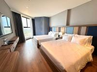 Apec Mandala Wyndham Mũi Né - R1210にあるベッド