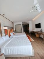 Apec Mandala Wyndham Mũi Né - R1210にあるベッド