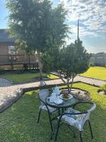 Zahrada ubytování MoOs River Lodge