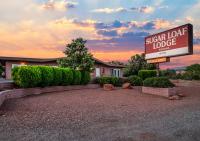 a sign for a signlor lord lodge in front of a building at Sugar Loaf Lodge in Sedona