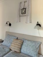 Łóżko lub łóżka w pokoju w obiekcie Villa Renata