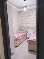 Postel nebo postele na pokoji v ubytování Adenaz 1 Apart