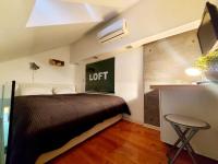 Posteľ alebo postele v izbe v ubytovaní Loft Osijek