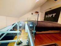 Posteľ alebo postele v izbe v ubytovaní Loft Osijek