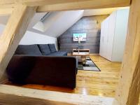 Televízia a/alebo spoločenská miestnosť v ubytovaní Loft Osijek