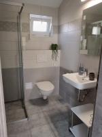 Koupelna v ubytování Apartmán u Révy