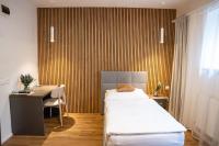 Postel nebo postele na pokoji v ubytování Hotel Sharingham