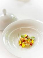 Un plato blanco con algo de comida. en Best Western Sévan Parc Hôtel, en Pertuis