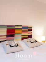 Łóżko lub łóżka w pokoju w obiekcie Nancy Gare Superbe appartement