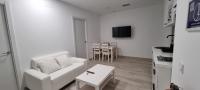 TV a/nebo společenská místnost v ubytování APARTAMENTOS TANEZ SANTURCE a