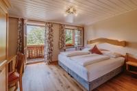 Łóżko lub łóżka w pokoju w obiekcie Landhotel Gschirnwirt