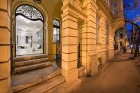 a building with a window of a store with a dress in it at Wilson Palace by LOFT in Bratislava