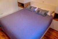Postel nebo postele na pokoji v ubytování Comfort and affordable apartments Slavica