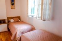 Postel nebo postele na pokoji v ubytování Comfort and affordable apartments Slavica