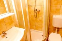 Koupelna v ubytování Comfort and affordable apartments Slavica