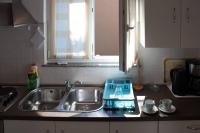 Kuchyň nebo kuchyňský kout v ubytování Comfort and affordable apartments Slavica