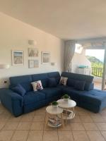 A seating area at Sardegna Costa Corallina Appartamento Luxury Vista Mare in splendido villaggio - IUN R6511