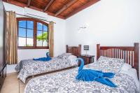 Postel nebo postele na pokoji v ubytování Villa Emilia