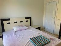 Postel nebo postele na pokoji v ubytování Two bedrooms apartment in Resort
