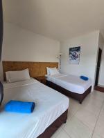 Postel nebo postele na pokoji v ubytování Anattaya Holiday Home