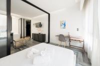 Posteľ alebo postele v izbe v ubytovaní Athenian Dream Suite