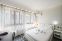 Posteľ alebo postele v izbe v ubytovaní Athenian Dream Suite