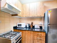 Kuchyň nebo kuchyňský kout v ubytování Canal View Studio - Burj Al Najoom-L15 - Near Dubai Mall