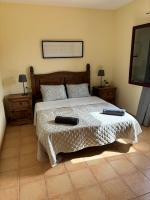 A bed or beds in a room at Casa Mía