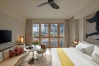 21 Carpenter, Singapore, a Member of Design Hotelsにあるベッド