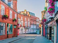 an empty street in a city with buildings at The White Hart Hotel Lincoln in Lincoln