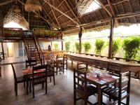 En restaurant eller et andet spisested på Seagull Nungwi Resort