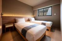 Ski Inn Hakuba, Iwatakeにあるベッド