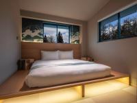Ski Inn Hakuba, Iwatakeにあるベッド