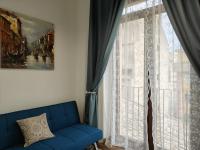 A seating area at Suite Inn Centro Dimora Storica
