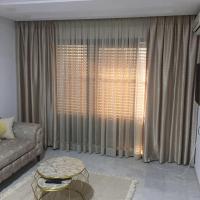 Posezení v ubytování Appartement la falaise