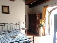 Posteľ alebo postele v izbe v ubytovaní La Locanda del Frullo