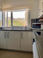 A kitchen or kitchenette at Casa Jazmín Fuentes de Almuñecar