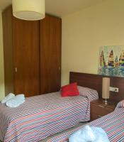 A bed or beds in a room at Casa Jazmín Fuentes de Almuñecar