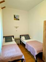 Posteľ alebo postele v izbe v ubytovaní Paula Apartment - Green home by the sea