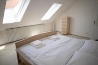 Postel nebo postele na pokoji v ubytování Amenity Apartmány Perná