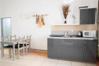 Kuchyň nebo kuchyňský kout v ubytování Amenity Apartmány Perná